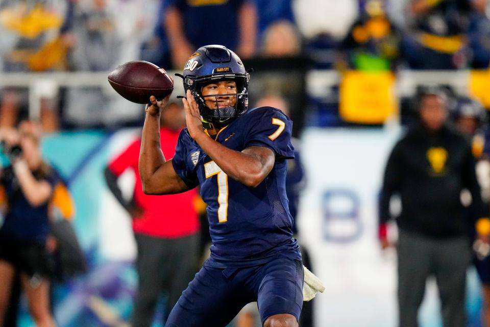 Toledo Rockets quarterback Dequan Finn throws a pass against the Liberty Flames during the second half in the Boca Raton Bowl at FAU Stadium in Boca Raton, Florida, Dec. 20, 2022.