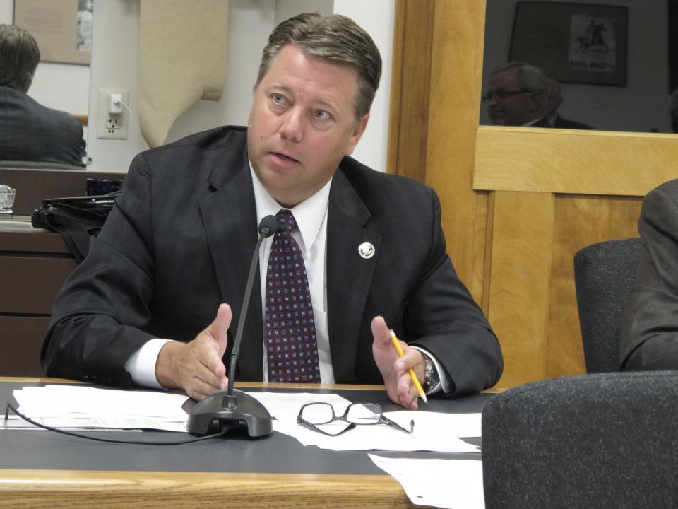 North Dakota state Rep. Mike Nathe, R-Bismarck, speaks during a property tax discussion on Tuesday, Sept. 11, 2012, during a meeting of the North Dakota Legislature's interim Taxation Committee in the Roughrider Room of the North Dakota Capitol in Bismarck, N.D. The committee recommended two primary bills for reducing property taxes be introduced in the 2013 Legislature. (AP Photo/Dale Wetzel)