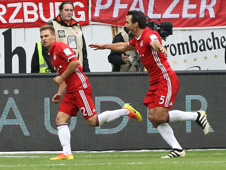 Joshua Kimmich (left) celebrates after scoring Bayern's second goal against Eintracht Frankfurt