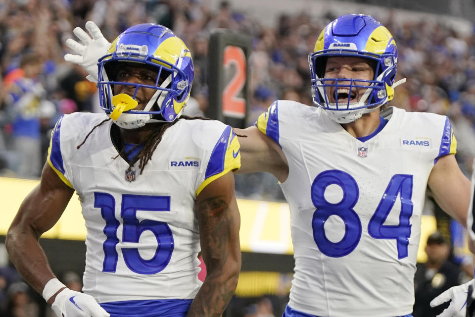 Los Angeles Rams wide receiver Demarcus Robinson (15) celebrates his touchdown catch with tight end Hunter Long (84) during the second half of an NFL football game against the Cleveland Browns, Sunday, Dec. 3, 2023, in Inglewood, Calif. (AP Photo/Mark J. Terrill)