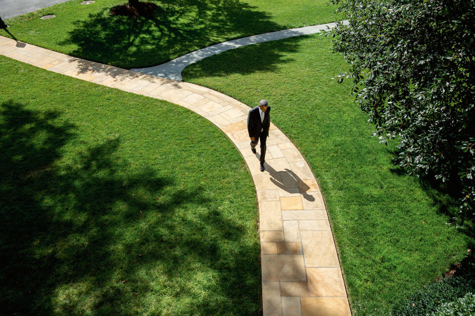 President Barack Obama walks back to the Oval Office after bidding farewell to Pope Francis on the South Lawn of the White House, Sept. 23, 2015. [Photo: Official White House Photo by Lawrence Jackson] 