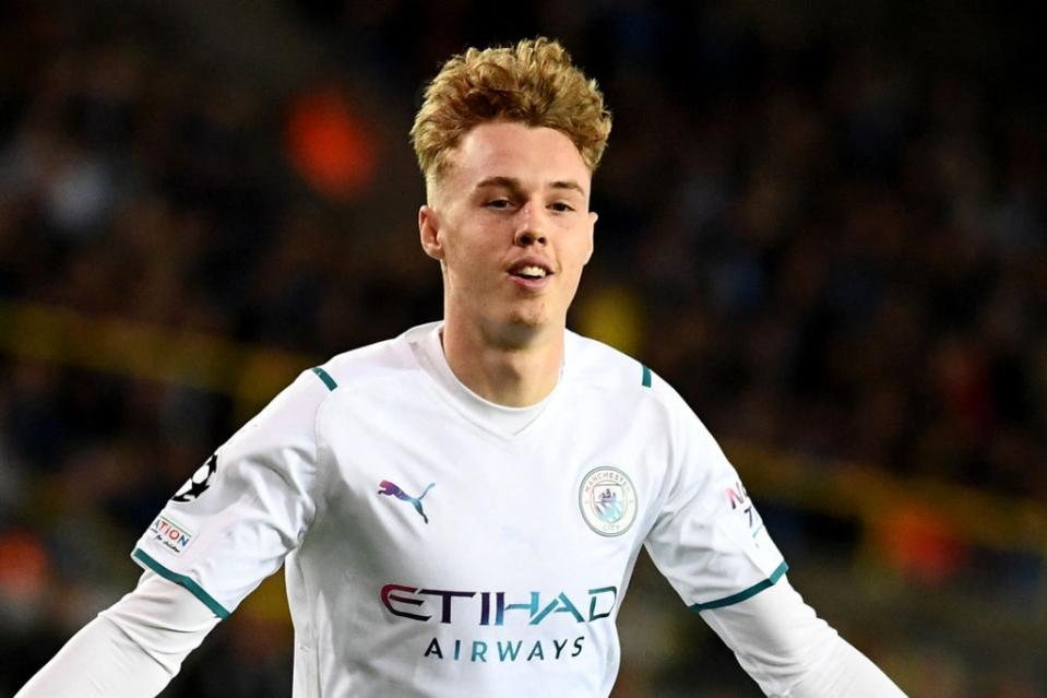 Cole Palmer scored his first Champions League goal for Manchester City in Belgium  (AFP via Getty Images)