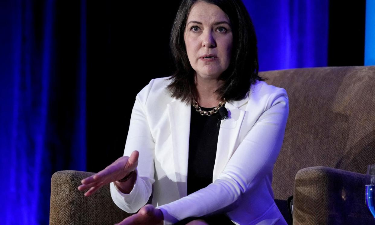 <span>Alberta premier Danielle Smith speaks at the Calgary Chamber of Commerce meeting in Calgary, Alberta, on 18 November 2022.</span><span>Photograph: Todd Korol/Reuters</span>