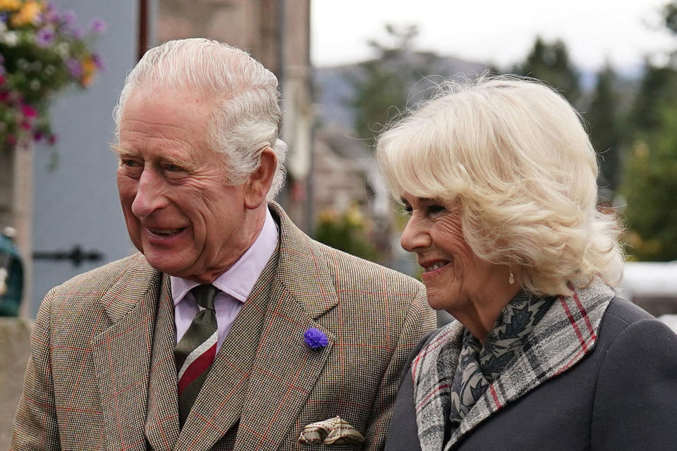 Britain's King Charles III (L) and Britain's Camilla, Queen Consort (R) arrive at a reception to thank the community of Aberdeenshire for their organisation and support following the death of Queen Elizabeth II at Station Square, the Victoria & Albert Halls, in Ballater, on October 11, 2022. (Photo by Andrew Milligan / POOL / AFP) (Photo by ANDREW MILLIGAN/POOL/AFP via Getty Images)