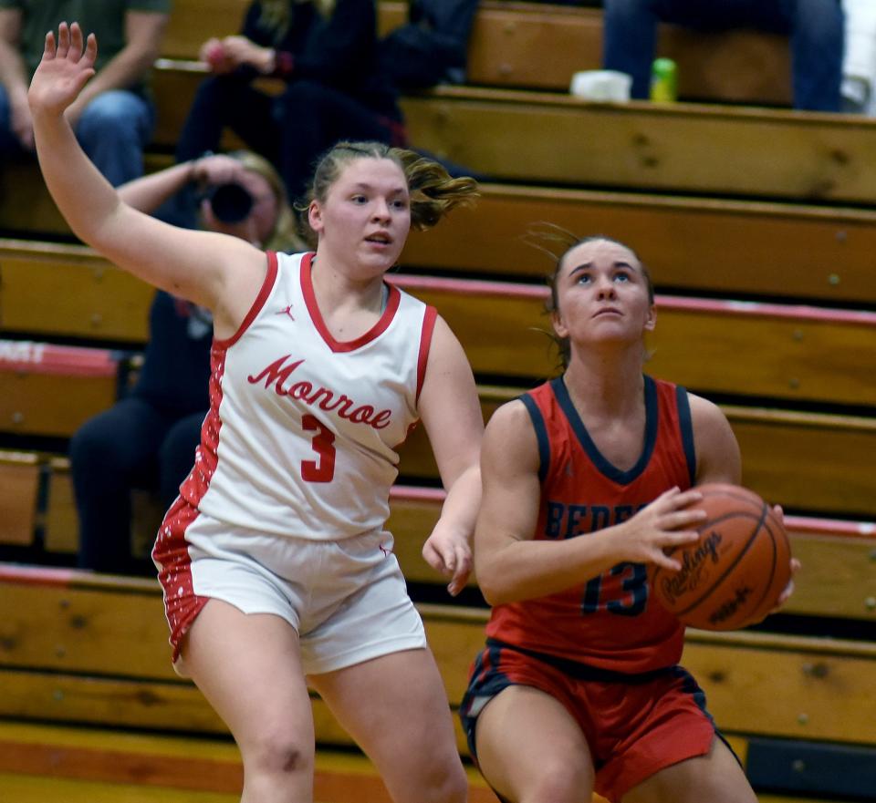 Payton Pudlowski of Bedford looks to score guarded by Alana Aulph of Monroe Thursday, Feb. 1, 2024.