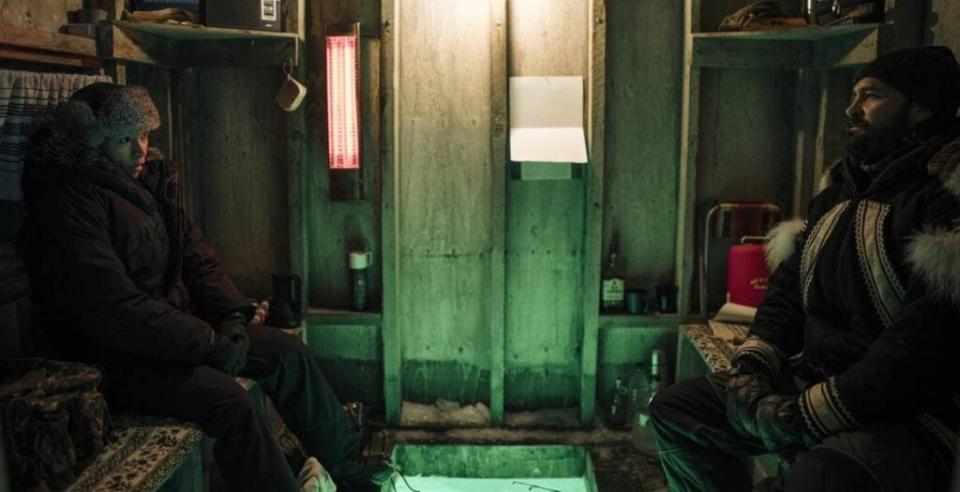 Qavvik and Nvavarro sit in a ice shack during episode 3 in Season 4 of True detective.