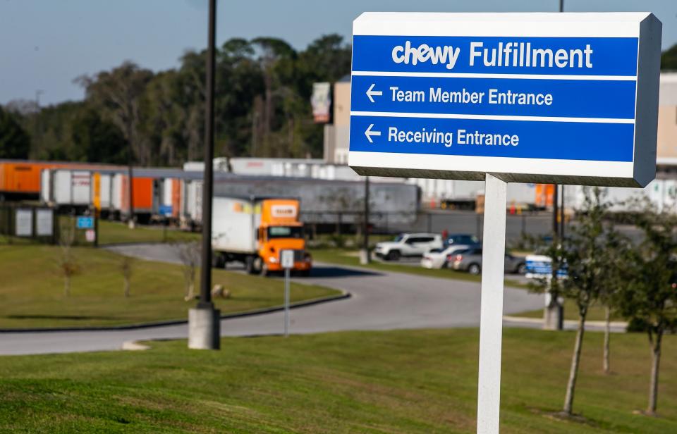 A truck leaves the Chewy distribution center loading docks on Jan. 6.