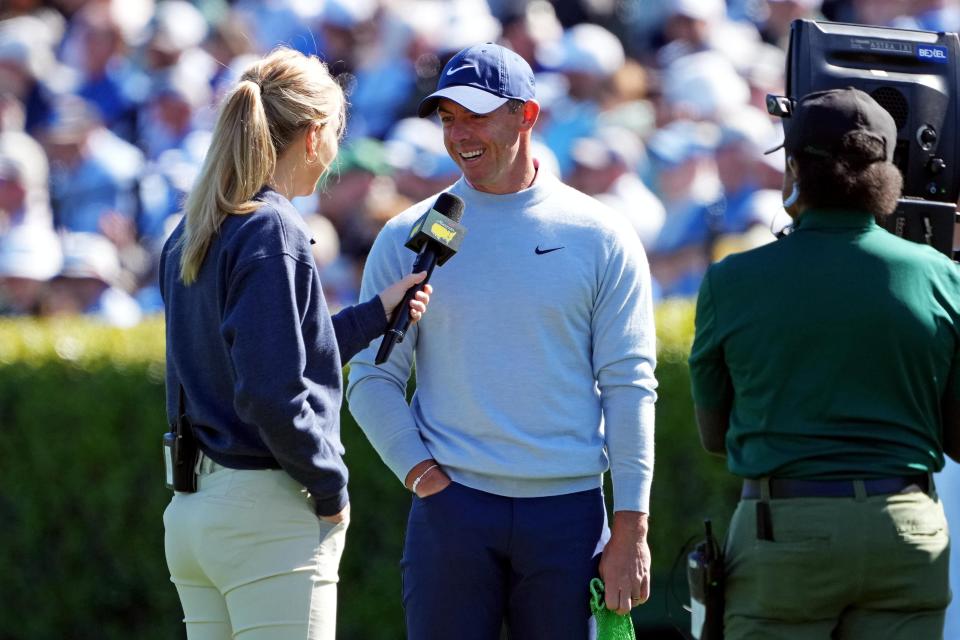 Rory McIlroy is interviewed on the driving range during the third round of the Masters.