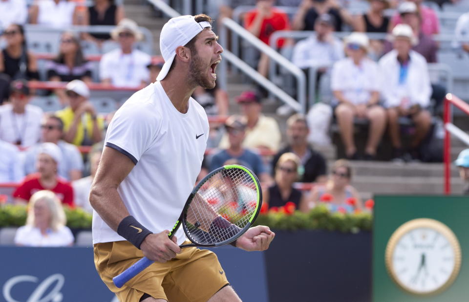 Karen Khachanov, of Russia, celebrates his victory over Felix Auger-Aliassime, of Canada, during the Rogers Cup men’s tennis tournament Thursday, Aug. 8, 2019, in Montreal. (Paul Chiasson/The Canadian Press via AP)