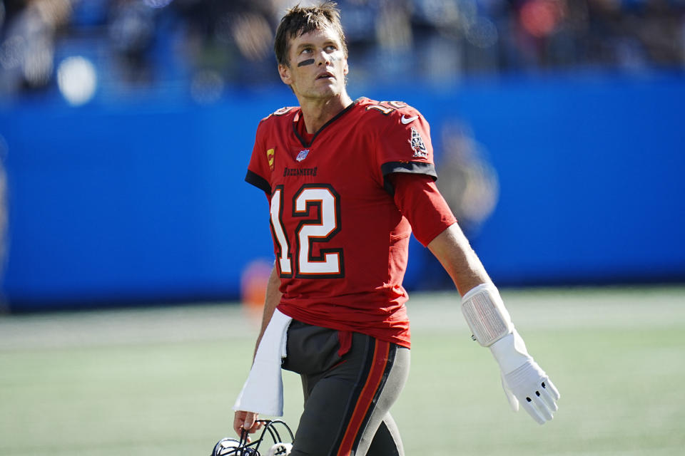 Tampa Bay Buccaneers quarterback Tom Brady (12) looks at the scoreboard after failing to convert a fourth down play in the fourth quarter during the second half of an NFL football game against the Carolina Panthers Sunday, Oct. 23, 2022, in Charlotte, N.C. (AP Photo/Rusty Jones)