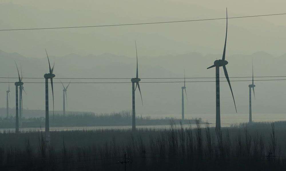 <span>Photograph: Ng Han Guan/AP</span>