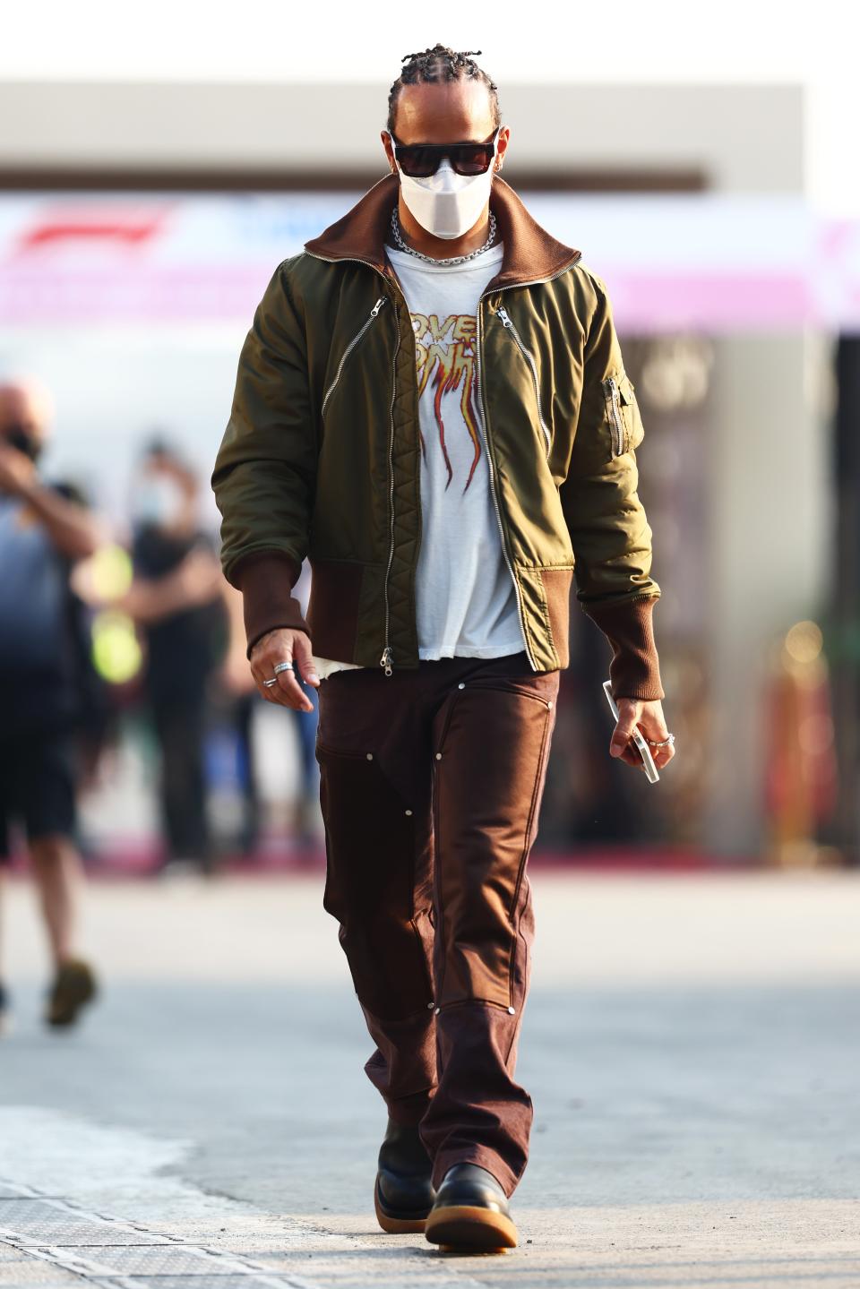 Lewis Hamilton of Great Britain and Mercedes GP walks in the Paddock (Getty)