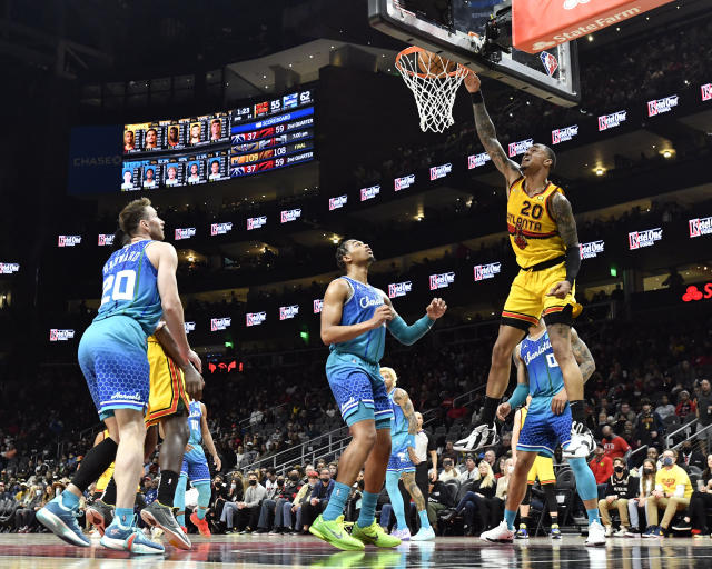 Short-handed Hornets lean on 3-pointers, top Hawks 130-127