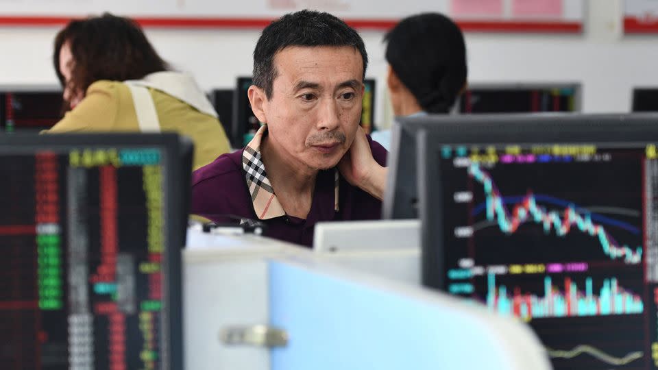 Investors monitor stock movements at a securities company in Fuyang, in China's eastern Anhui province on August 28, 2023. - Stringer/AFP/Getty Images