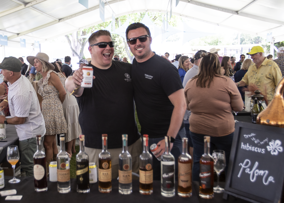 Patrick Brooks and John Lewis from Tin City Distillery have fun at the Paso Wine Fest on Saturday, May 20, 2023. The festival celebrated its 40th year in Paso Robles, featuring the Grand Tasting, winemaker dinners and special events at area wineries.