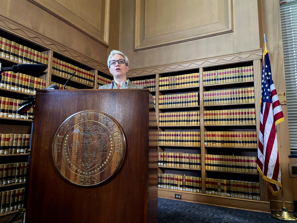 Newly sworn-in Oregon Gov. Tina Kotek talks after signing three executive orders intended to combat homelessness at the State Library of Oregon in the state capital Salem on Tuesday, Jan. 10, 2023, her first full day in office. The executive orders declared a homeless emergency in most of the state, increased housing construction targets and directed state agencies to prioritize reducing homelessness. (AP Photo/Claire Rush)
