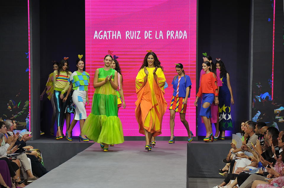 Models in Agatha Ruiz de la Prada designs on the runway in Montenegro.