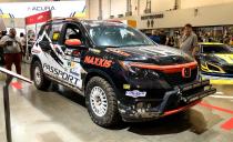 <p>Honda R&D in Ohio built this rally-ready <a href="https://www.caranddriver.com/honda/passport" rel="nofollow noopener" target="_blank" data-ylk="slk:Honda Passport;elm:context_link;itc:0;sec:content-canvas" class="link ">Honda Passport</a> in their spare time. It has already survived a handful of rally competitions, finishing second in its class at the <a href="https://www.caranddriver.com/features/a22607112/smokehio-our-rally-prepped-1997-subaru-impreza-puts-on-a-smoke-show/" rel="nofollow noopener" target="_blank" data-ylk="slk:Southern Ohio Forest Rally;elm:context_link;itc:0;sec:content-canvas" class="link ">Southern Ohio Forest Rally</a>. It has had typical safety additions like a roll cage, but other than that it's unchanged except for tires, brake pads, wheels, and skid plates. Oh, there's also the addition of a hand-operated hydraulic brake, for epic drift action.</p>