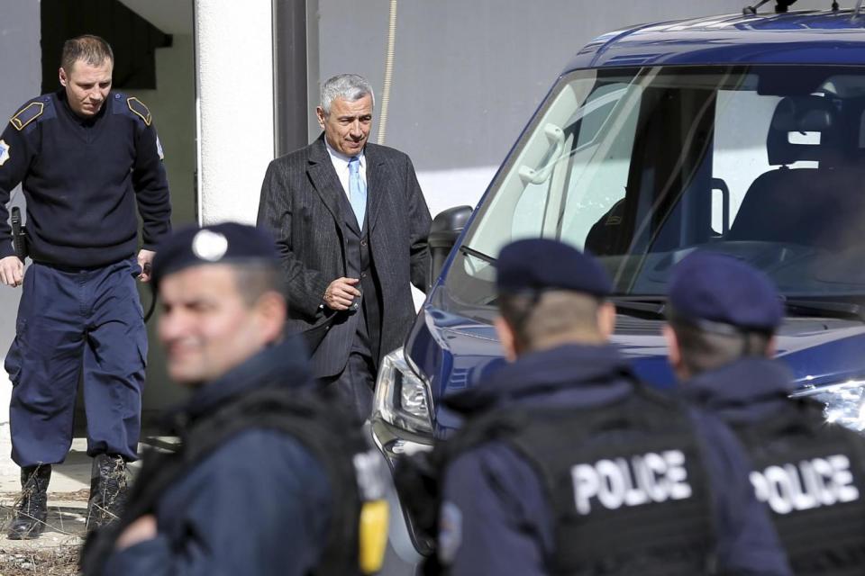 Doctors struggled to save the life of Kosovo Serb politician Oliver Ivanovic, shown here in 2017 leaving the prison in the northern, Serb-dominated part of Mitrovica (AP)