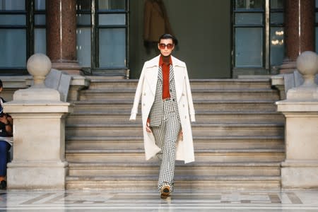 A model presents a creation during the Victoria Beckham catwalk show at London Fashion Week in London