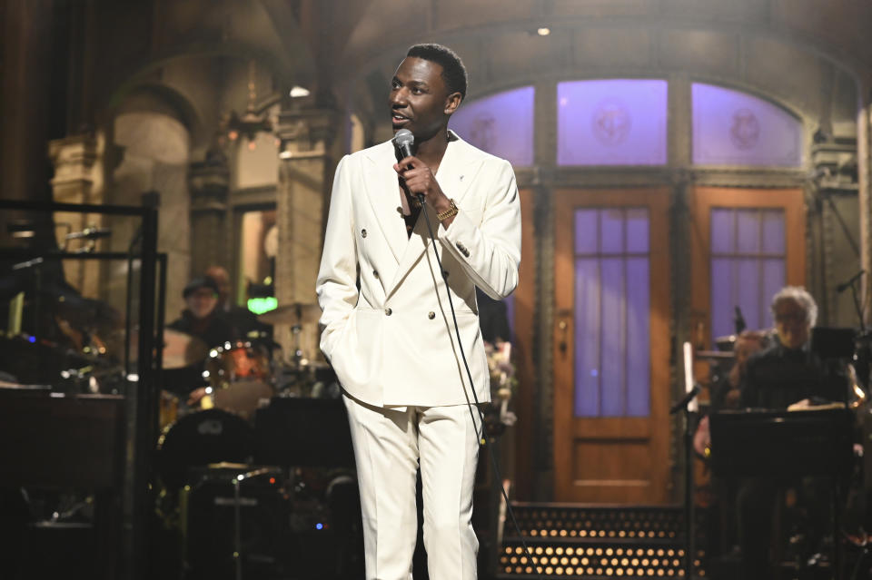 This image released by NBC shows host Jerrod Carmichael during his monologue on "Saturday Night Live." Carmichael will host next month’s Golden Globe Awards. (Will Heath/NBC via AP)