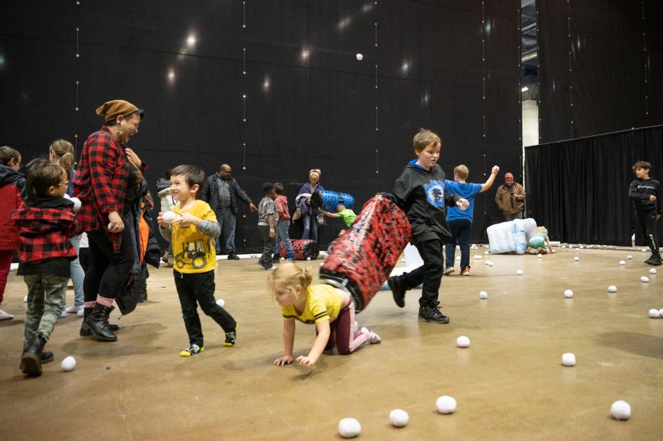 Attendees participate in the indoor snowball fight during the Winter Wanderland event at Kellogg Arena on Friday, Dec. 2, 2022.