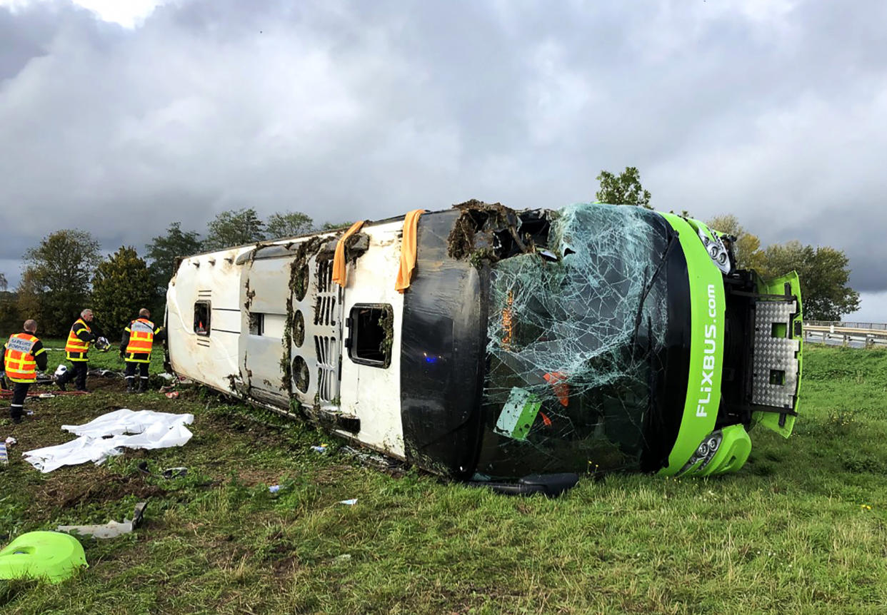 Emergency services are at work on the site of an accident after a bus from the Flixbus company overturned as it took an exit from the A1 motorway, injuring 29 passengers and seriously wounding 4, on November 3, 2019 near Berny-en-Santerre, northern France. (Photo by FRANCOIS LO PRESTI / AFP) (Photo by FRANCOIS LO PRESTI/AFP via Getty Images)