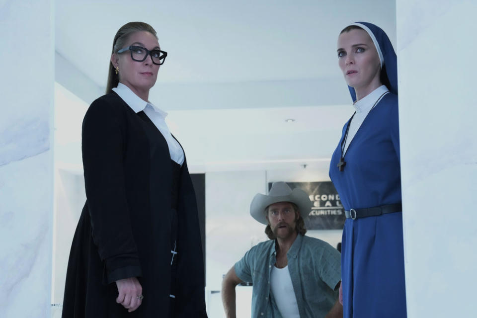 MRS. DAVIS -- Episode 106 -- Pictured: (l-r) Elizabeth Marvel as Celeste, Jake McDorman as Wiley, Betty Gilpin as Simone -- (Photo by: Greg Gayne/Peacock)