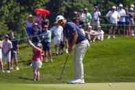 Xander Schauffele putts on the fourth hole during the third round of the Travelers Championship golf tournament at TPC River Highlands, Saturday, June 25, 2022, in Cromwell, Conn. (AP Photo/Seth Wenig)