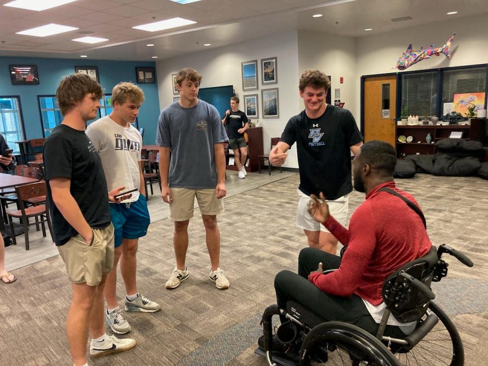 Former Florida basketball star Patric Young, paralyzed nearly 20 months ago from a single-vehicle accident just 10 days before his wedding, gave an inspirational message Monday to members of the Ponte Vedra High lacrosse team at the school's media center.