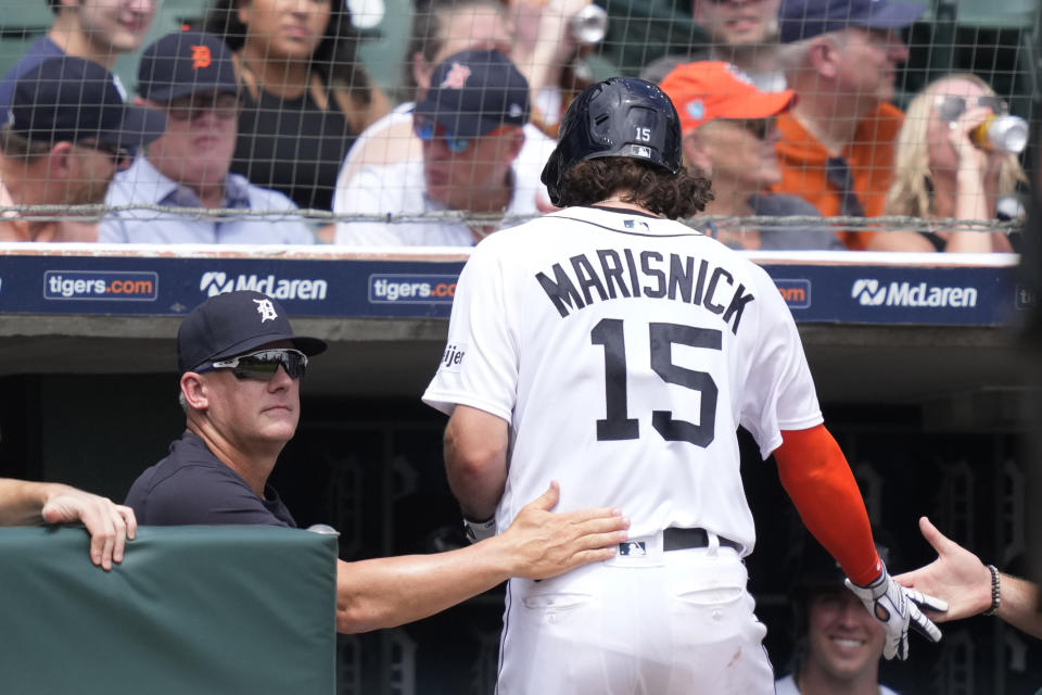 Detroit Tigers' Jake Marisnick is greeted by manager A.J. Hinch after a solo home run during the sixth inning of a baseball game against the Oakland Athletics, Thursday, July 6, 2023, in Detroit. (AP Photo/Carlos Osorio)