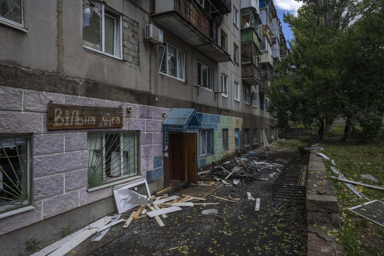 A five-story residential building damaged from a rocket attack on a residential area, in Kramatorsk, eastern Ukraine, Tuesday, July 19, 2022. (AP Photo/Nariman El-Mofty)