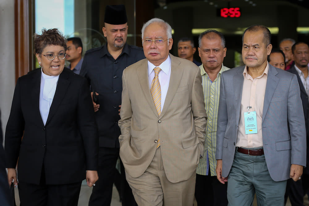 Former prime minister Datuk Seri Najib Razak leaves the Kuala Lumpur High Court December 11, 2019. — Picture by Yusof Mat Isa