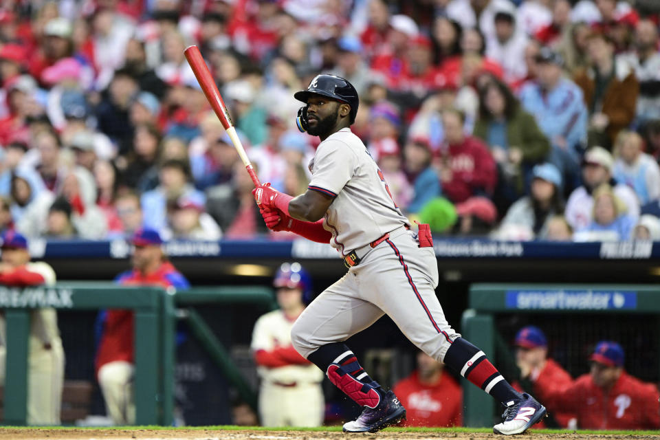 Atlanta Braves' Michael Harris II watches the ball after hitting a single during the fifth inning of a baseball game against the Philadelphia Phillies, Saturday, March 30, 2024, in Philadelphia. (AP Photo/Derik Hamilton)