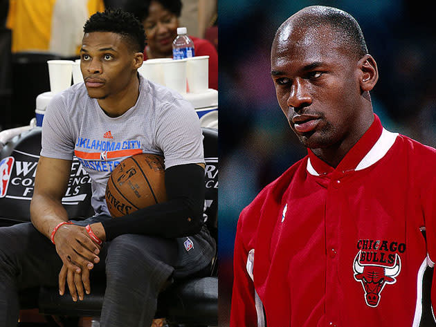 Russell Westbrook and Michael Jordan eye the competition. (Getty Images)