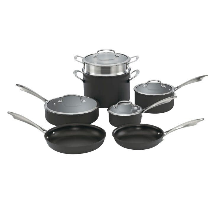 black pots and pans with silver and glass lids