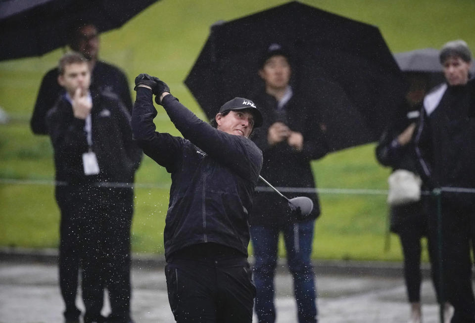 Phil Mickelson tees off on the 10th hole during the first round of the Genesis Open golf tournament at Riviera Country Club Thursday, Feb. 14, 2019, in the Pacific Palisades area of Los Angeles. (AP Photo/Ryan Kang)