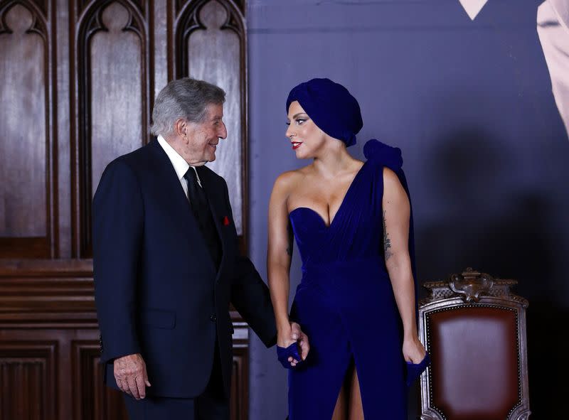 U.S. singers Lady Gaga and Tony Bennett arrive at a news conference ahead of their concert in Brussels