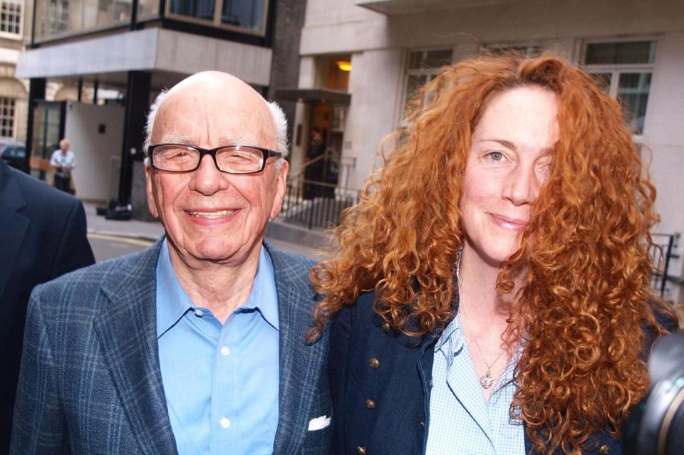 Mr Murdoch with News International chief executive Rebekah Brooks in 2011 (PA)