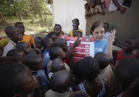United Nations Children's Fund (UNICEF) Ivory Coast Representative Adele Khudr speaks to children during an Ebola awareness drive in Toulepleu, at the border of Liberia, in western Ivory Coast, in this file photo taken on November 4, 2014. REUTERS/Thierry Gouegnon