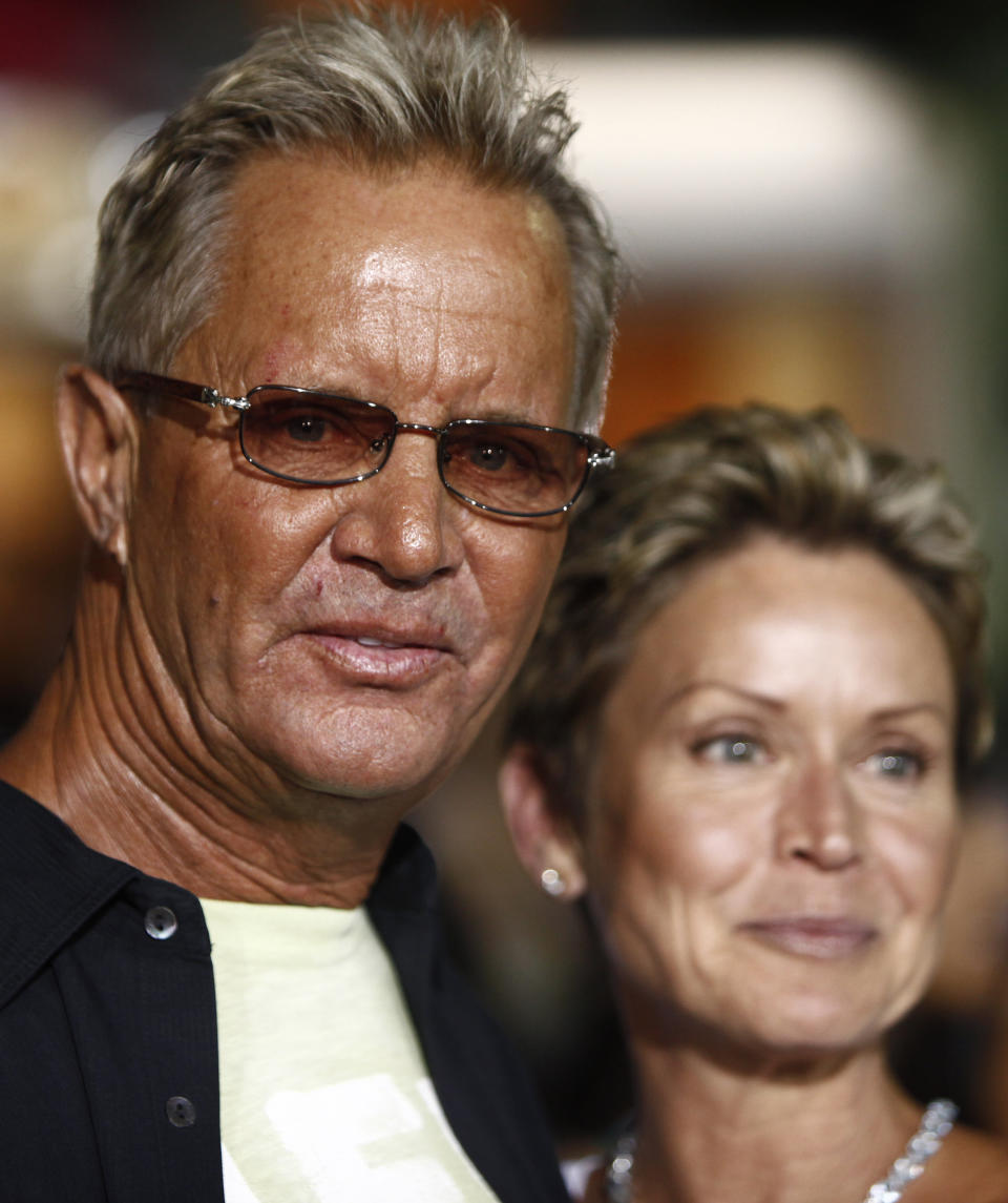 FILE - In this Aug. 27, 2009 file photo, Director David R. Ellis, left, and his wife, Cindy, arrive at the premiere of "The Final Destination" in Los Angeles. The "Snakes on the Plane" director, Ellis, has died at age 60. His manager, David Gardner, confirmed his death Monday, Jan. 7, 2013, but declined to provide additional details. (AP Photo/Matt Sayles, File)