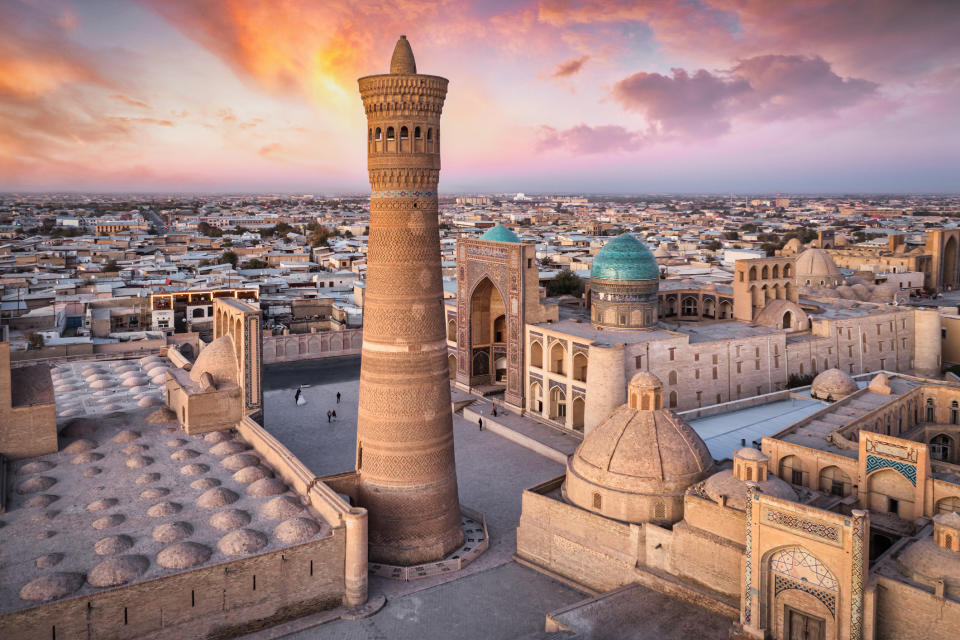 Colorful sunset over the famous old town in Uzbekistan.