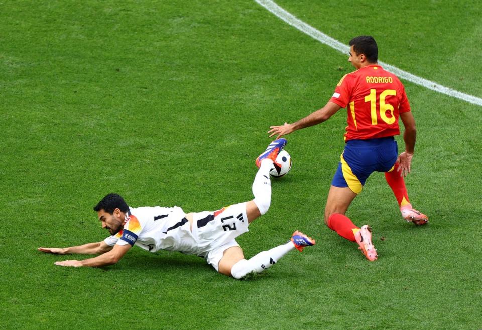 Rodri gets the better of Ilkay Gundogan (REUTERS)