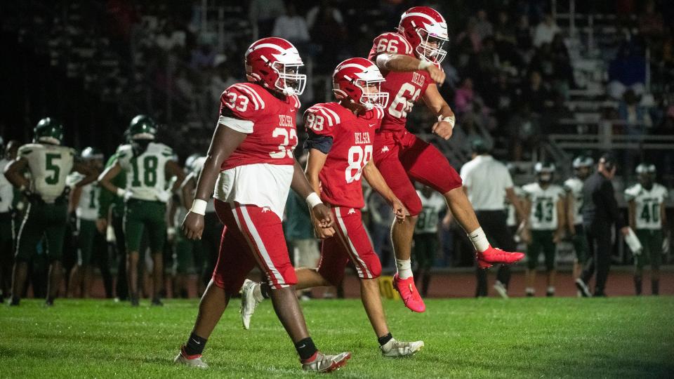 Members of the Delsea football celebrate after Delsea made a big defensive stop during the football game between Delsea and Winslow Township played at Delsea Regional High School in Franklinville on Friday, September 9, 2022. 