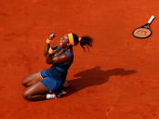 Serena Williams of United States of America celebrates match point in her Women's Singles Final match against Maria Sharapova of Russia during day fourteen of French Open at Roland Garros on June 8, 2013 in Paris, France.