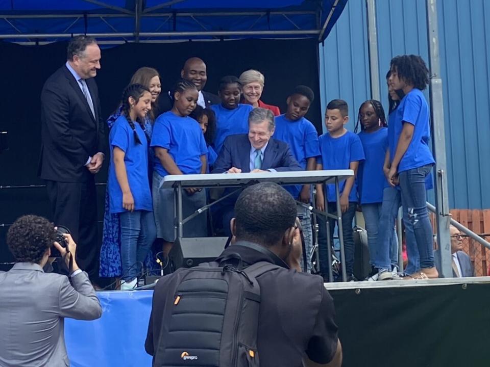 Gov. Roy Cooper signs a Juneteenth proclamation