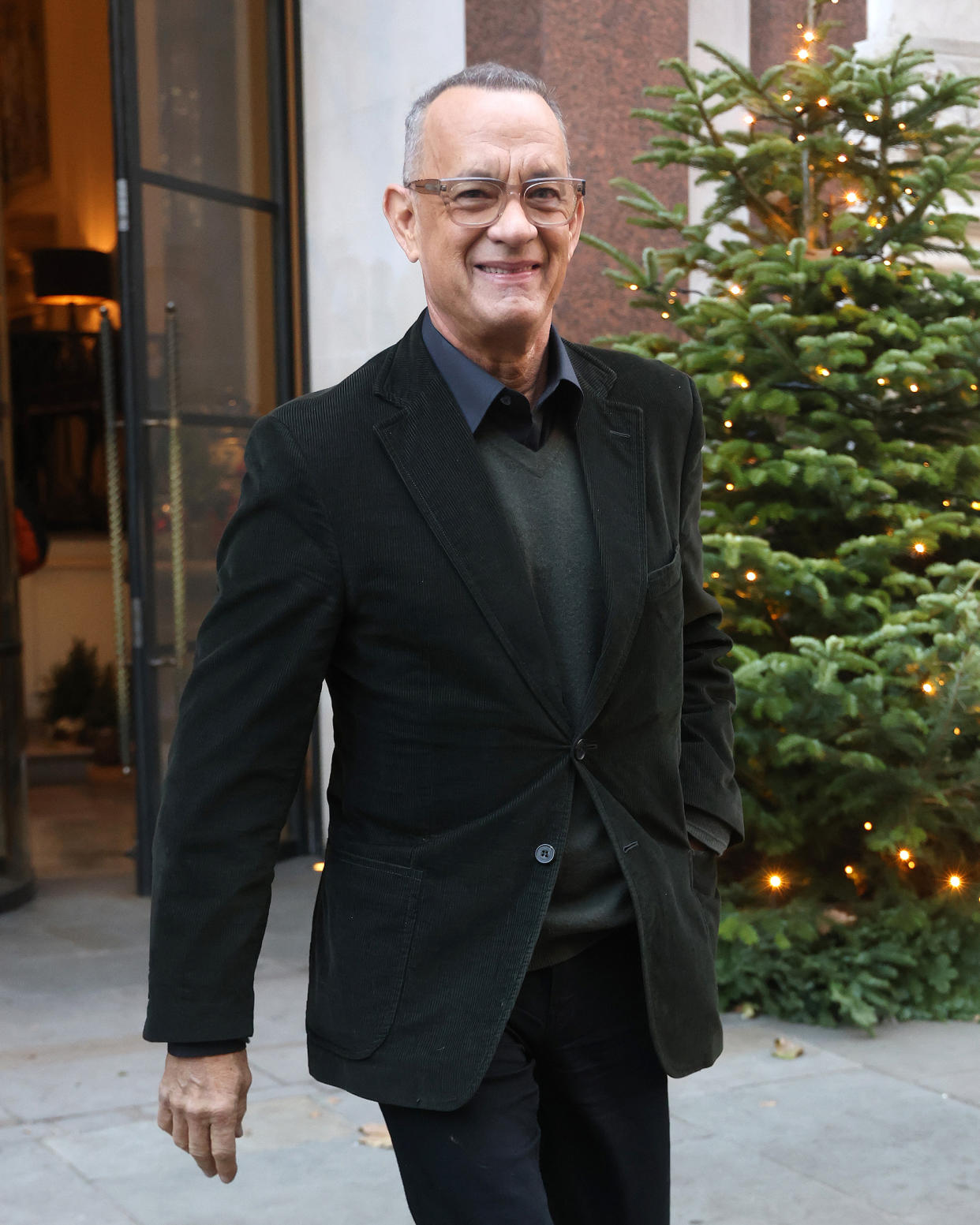 Tom Hanks leaving a photocall for new movie 'A Man Called Otto' at the Corinthia Hotel on December 16, 2022 in London, England.  (Neil Mockford / GC Images)