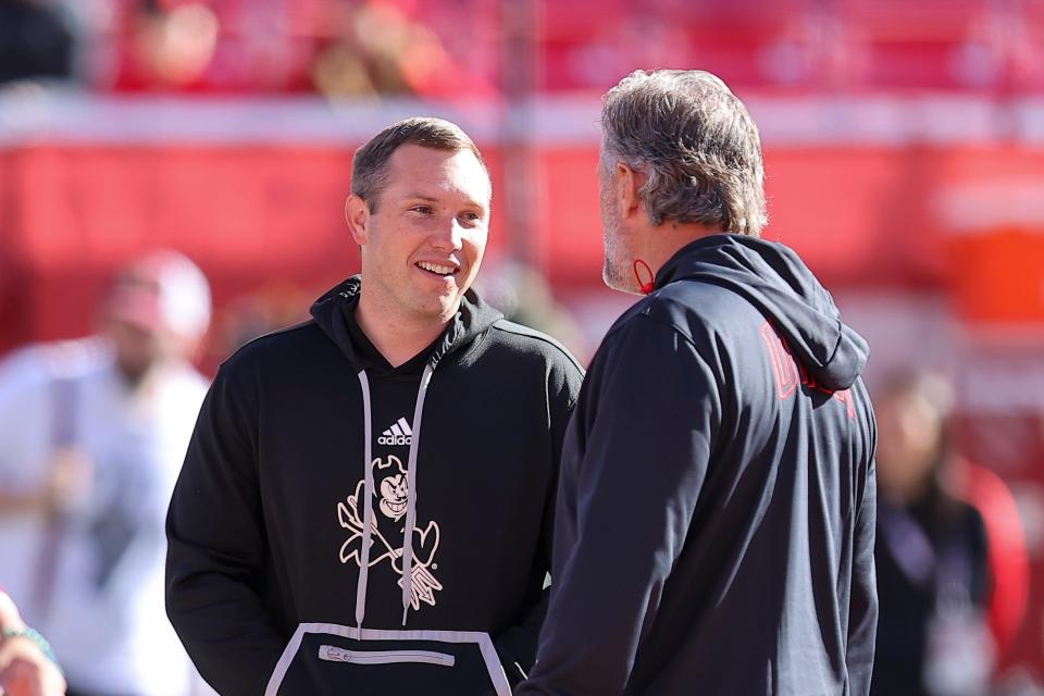 Arizona State Sun Devils head coach Kenny Dillingham speaks with Utah Utes head coach Kyle Whittingham before a game at Rice-Eccles Stadium in Salt Lake City on Nov. 4, 2023.