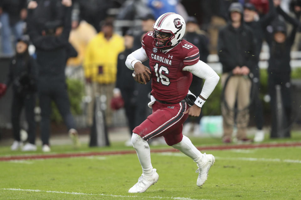 South Carolina quarterback LaNorris Sellers (16) crosses into the end zone for a 36-yard rushing touchdown during the second half of an NCAA college football game against Vanderbilt, Saturday, Nov. 11, 2023, in Columbia, S.C. (AP Photo/Artie Walker Jr.)