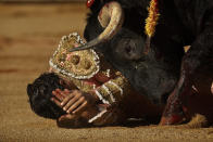<p>Spanish bullfighter Ivan Fandino is gored by a bull during a bullfight of the San Fermin festival, Pamplona, July 9, 2014. (Photo: Daniel Ochoa de Olza/AP) </p>
